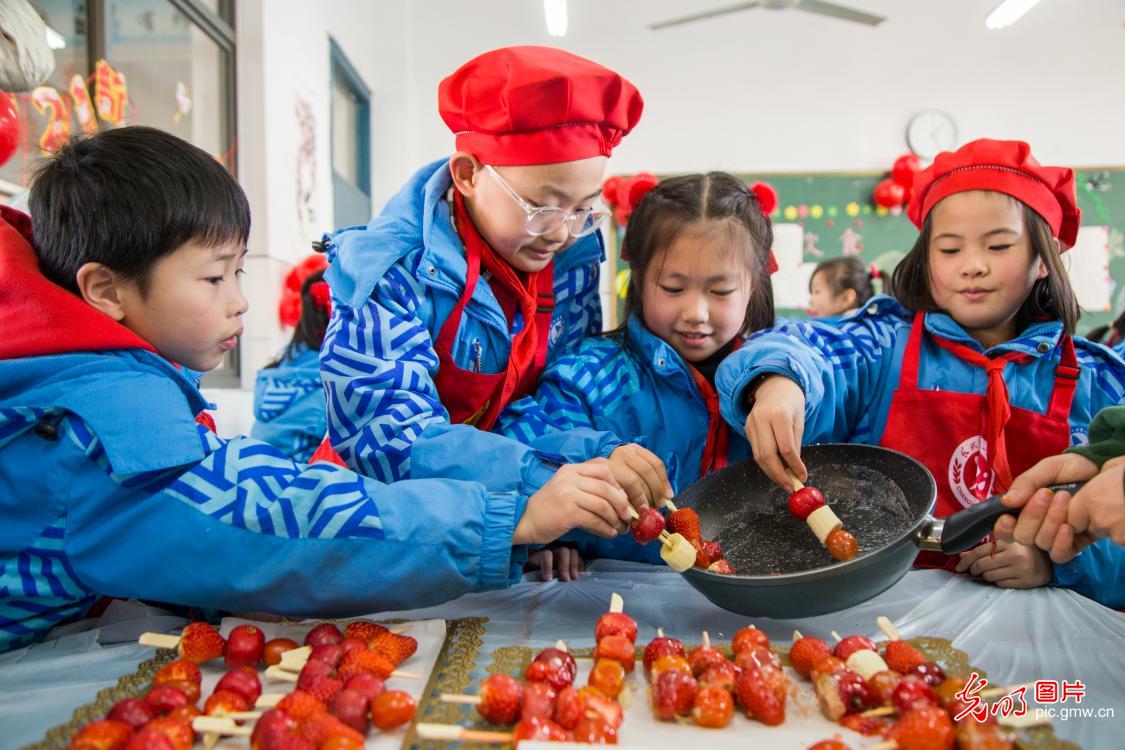 Sugar coated haws sweeten winter days in SE China's Zhejiang Sugar coated haws sweeten winter days in SE China's Zhejiang