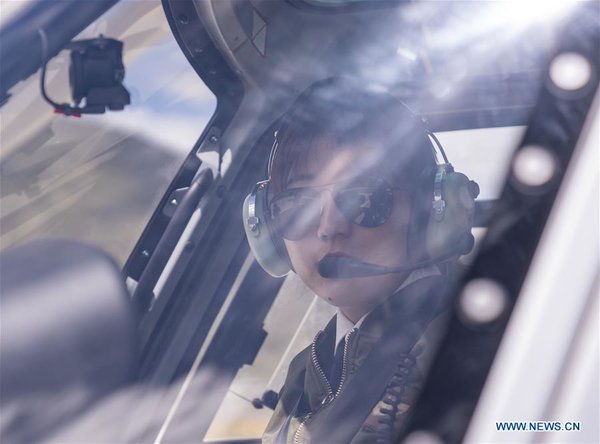 Female Pilot from Impoverished Family Flies Helicopter in China's Tibet